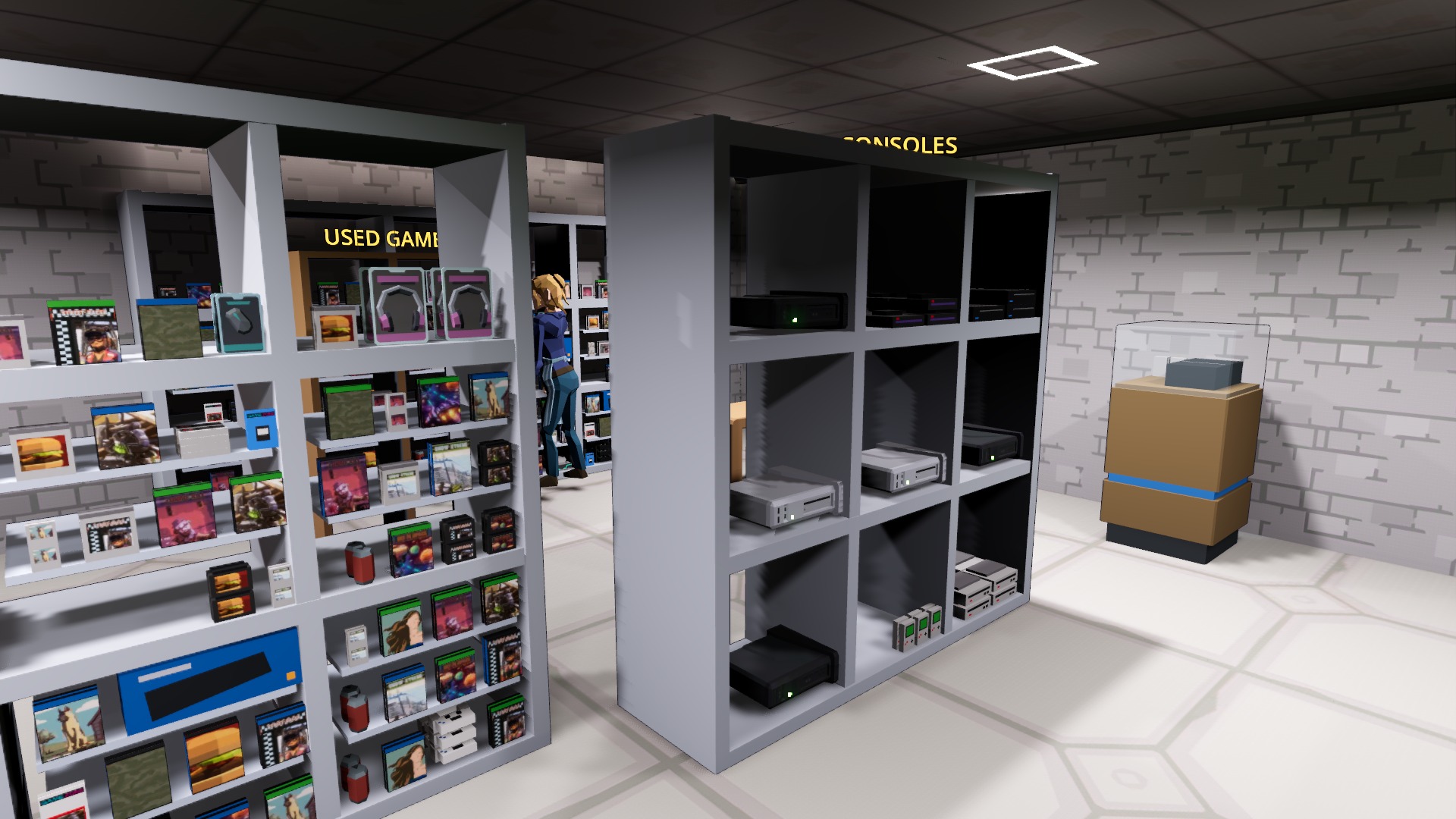 The Used Games Shelf and Used Console Display, full of pre-owned games and consoles